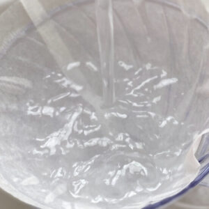 Image: V60 with filter paper filled with running water