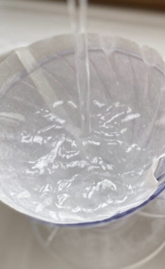 Image: V60 with filter paper filled with running water